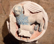 Gewölbeschlussstein: geflügelter Löwe